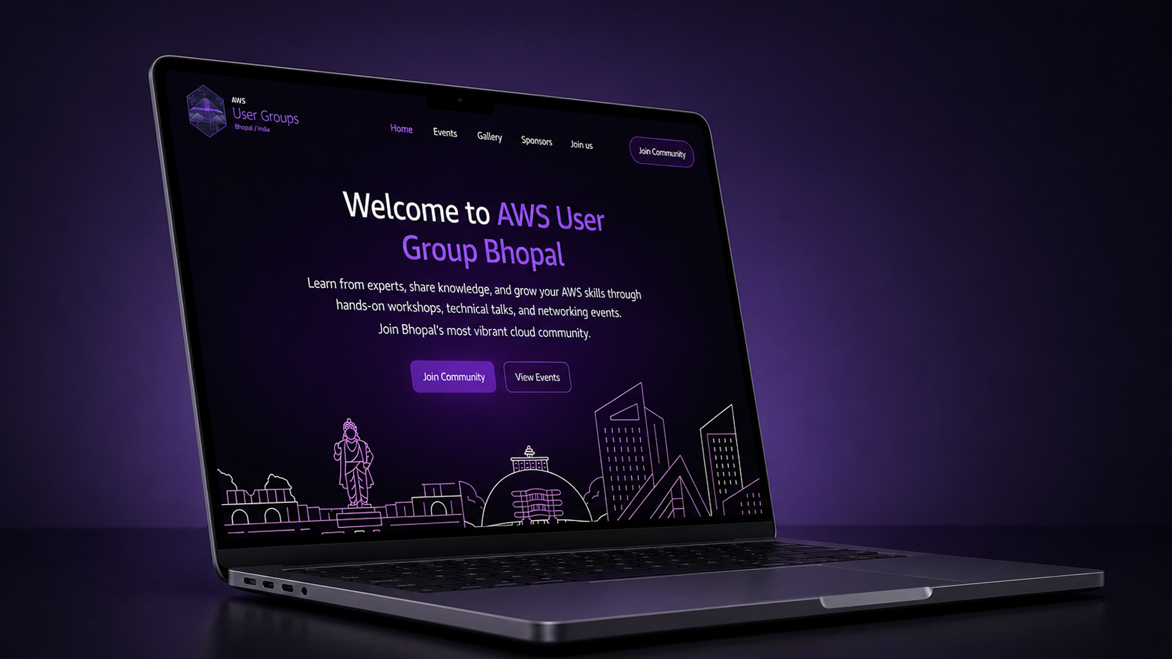 AWS User Group Bhopal website hero shown on a laptop against a purple backdrop